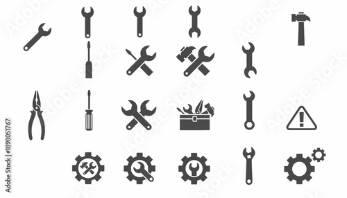 A collection of various tools and equipment for industrial work on a white background with gears and warning signs