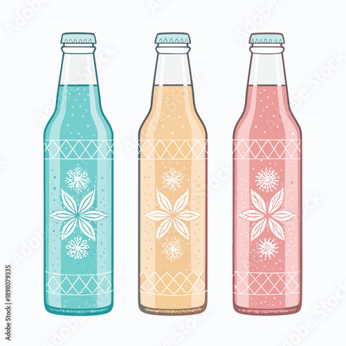 Three bottles with floral designs and colored liquids are displayed side by side in a row