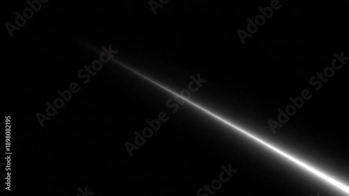 Animated White Diagonal Light Streak | Glowing Laser Beam or Saber Slash Wipe Transition | Abstract VFX Overlay Element on Black Background