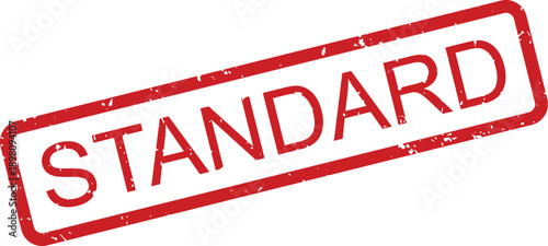 A distressed red rubber stamp with the word STANDARD clearly visible on a white surface