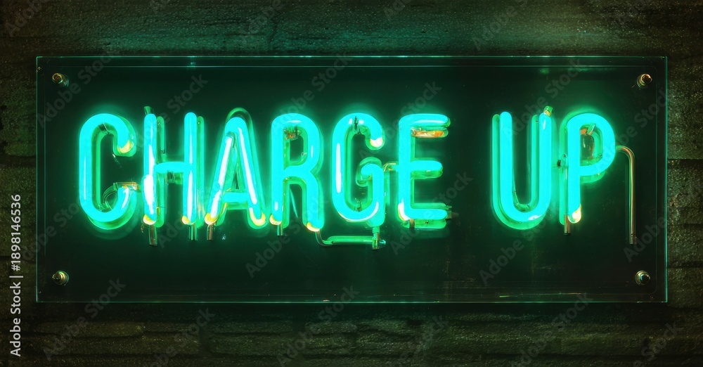 Obraz premium Bright neon sign displays Charge Up. Dark background emphasizes glowing text. Modern aesthetic, vibrant colors, simple message.