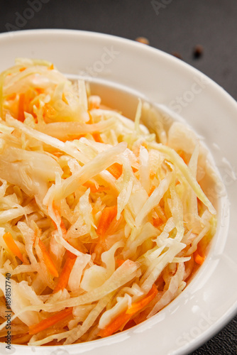 Sauerkraut cabbage vegetable salad coleslaw natural healthy food appetizer fresh tasty table setting gourmet food background on the table rustic food top view copy space vegetarian and vegan food