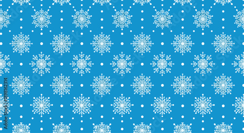 Repeating pattern of white hand drawn snowflakes of various shapes and sizes on a bright blue background for winter holiday decorations.