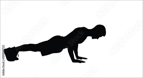 Person performing a push up exercise in a stark black silhouette