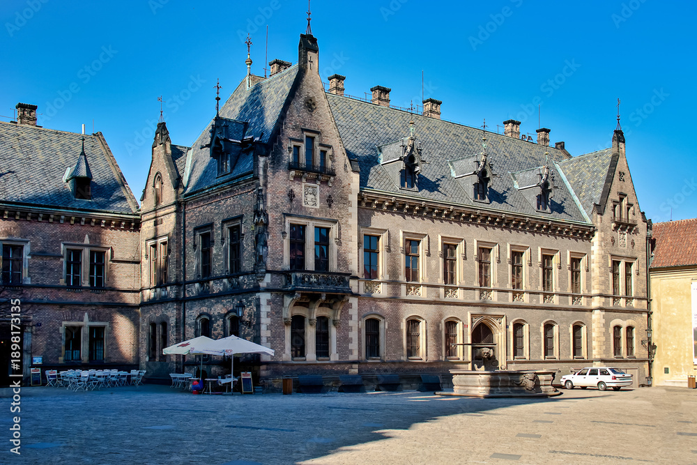 Fototapeta premium Historical buildings of New Provost Residence in neo-gothic style on square of Prague castle . Prague, Czech republic.