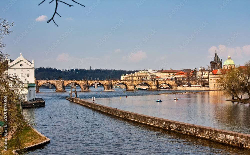 Obraz premium Scenic view of the Prague Old Town pier architecture. Seen from Charles Bridge over Vltava river in Prague, Czechia.
