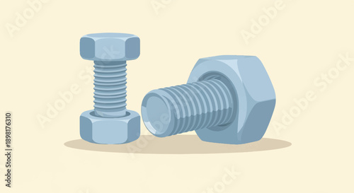Two grey metal nuts and bolts on a pale yellow background