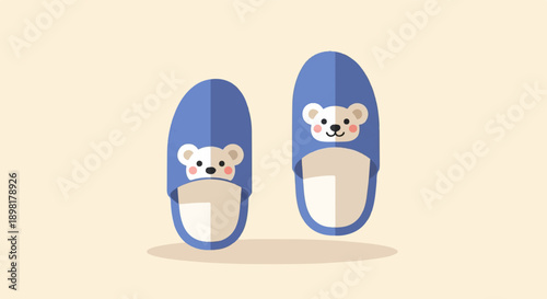 Two blue fuzzy slippers with cute bear faces, set against a light background