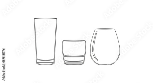 Three different empty drinking glasses on a white background.
