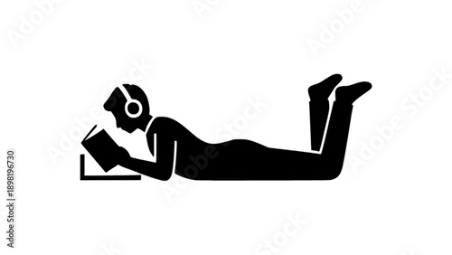 Person Lying Down Reading or Using Tablet