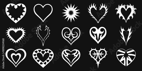 Collection of ornate white hearts and starburst shapes on black