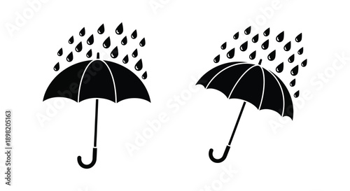 Two black umbrellas under falling rain a striking silhouette