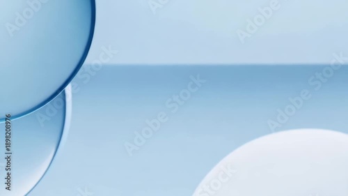 Abstract composition of spherical shapes in soft blue tones  