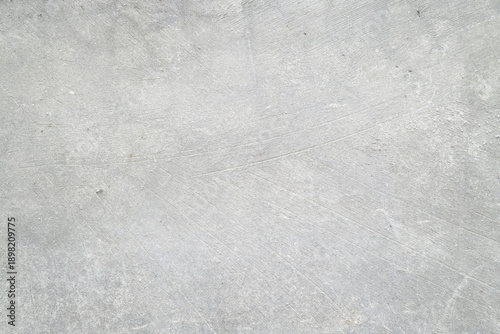 Фотография Textured grey concrete surface in frame, ideal for backgrounds in architecture, construction, urban design, and industrial projects