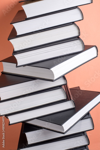 Background of standing open books on a colored background