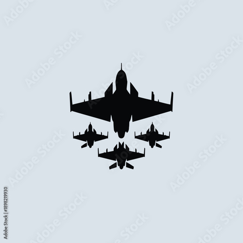 Formation flight of military aircraft with lead jet in silhouette against white background