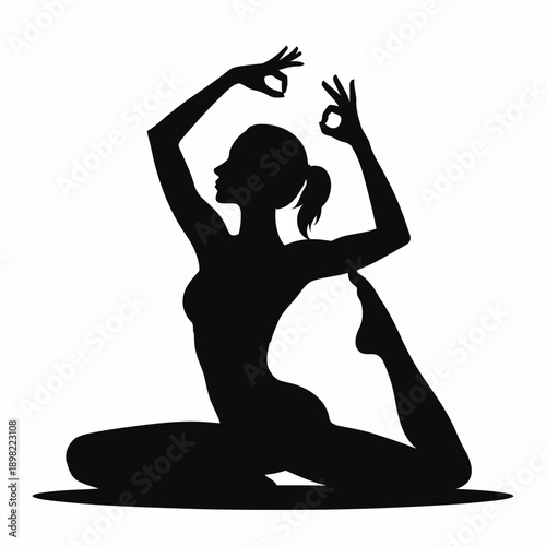 Graceful silhouette of a person practicing yoga in a meditative pose