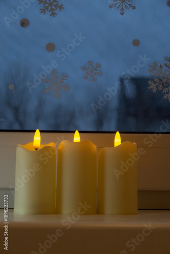 Christmas candles on the window