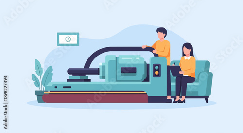 Two people interact with a large machine, one operating, one observing