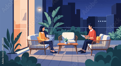 Two people work on a balcony at night with city buildings in background