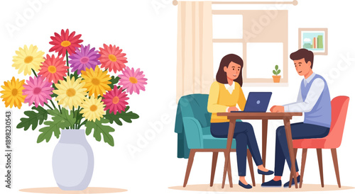 Two people work on a laptop at a table with a vase of colorful flowers