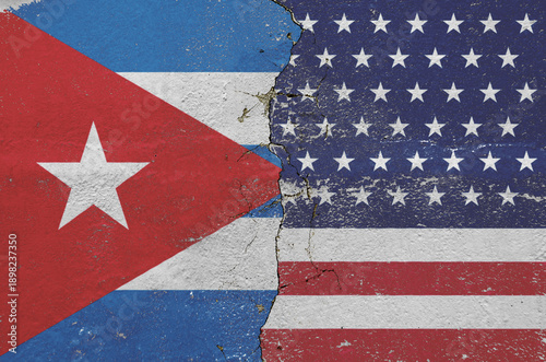 Photography flag of the United States of America and the flag of Cuba on the wall