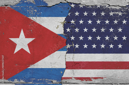 flag of the United States of America and the flag of Cuba on the wall