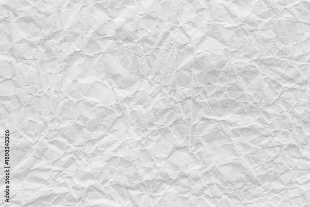 Naklejka premium White crumpled paper texture as background