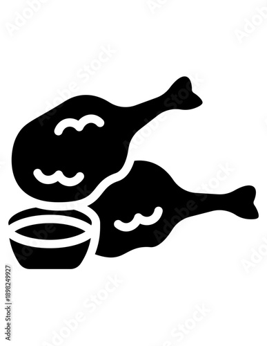 Black solid icon illustration of fried chicken drumsticks served with dipping sauce. Simple flat food symbol representing fast food, comfort food, restaurant menu, and culinary concepts.