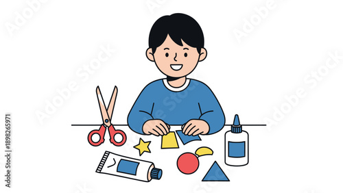 An Asian boy is happily engaged in a creative craft activity with colorful paper shapes, scissors, and glue, perfect for educational content or childrens learning materials.