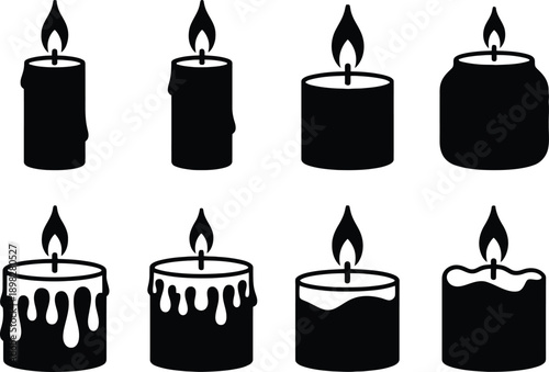 Set of eight black silhouette candle icons with flames burning brightly