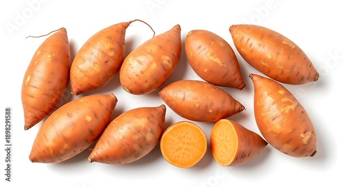 Group of Whole and Halved Sweet Potatoes Isolated on White Background