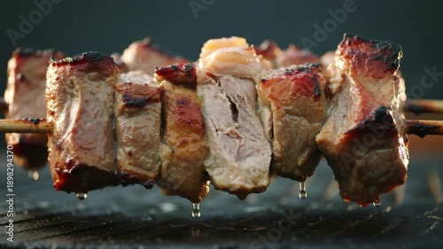 Grilled Meat Skewers Sizzling on Barbecue Glazed Pork Chunks Roasting Over Open Flame