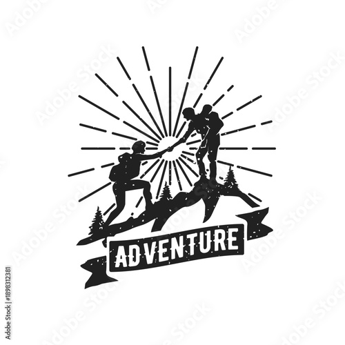 Teamwork in Adventure: Two Hikers Helping Hand on Mountain Silhouette with Sunburst