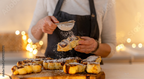 Photos Woman Sprinkling Powdered Sugar On Cookies