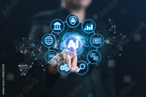 Businessman pointing at a glowing AI icon surrounded by digital business icons. Concept of artificial intelligence technology, global network connection, machine learning, and automation.