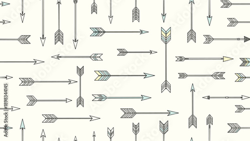 Seamless pattern displays a variety of tribal style arrows with different fletching and points on a light cream background.