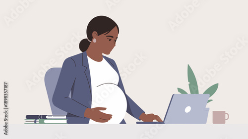 black pregnant woman working on a laptop at desk representing remote work, maternity lifestyle and work life balance concept