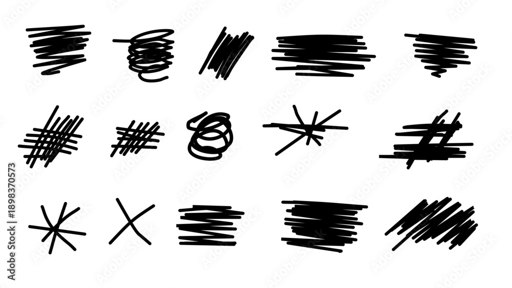 Fototapeta premium collection of black ink scribbles and messy crosshatch marks on white surface