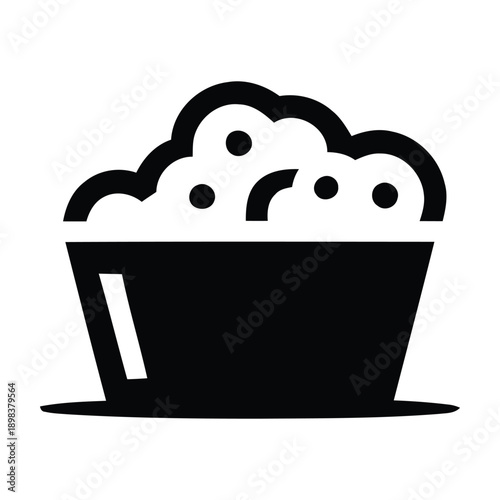 A bowl filled with fluffy whipped cream or marshmallow fluff.