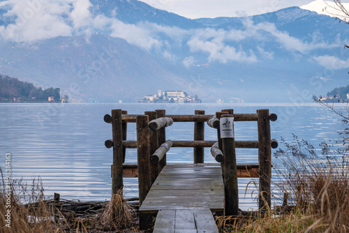 Slika na platnu Winter view of Orta San Giulio island, in the Orta Lake (piedmont, Northern Italy) seen from a lake pier
