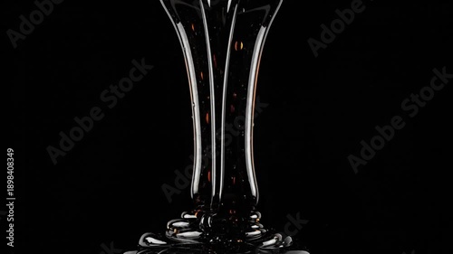Dark Liquid Cascade - A Viscous Descent in High Contrast.