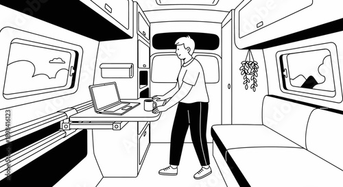 Man Working on Laptop in Camper.