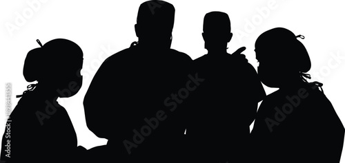 Silhouette of four people standing together