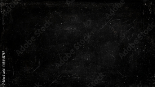 Scratched dark surface with scratches and marks