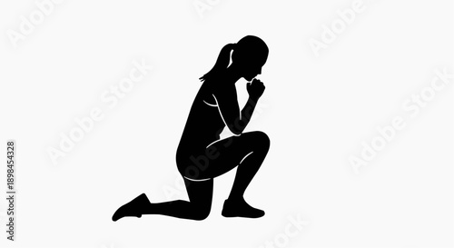 Silhouette of a person kneeling with hands clasped in a pose of reflection