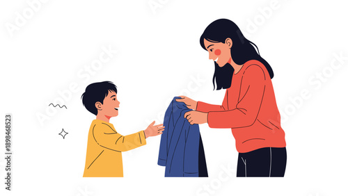 Caring mother helps her young son get ready to go outside by handing him his blue jacket during a cold day indoors.