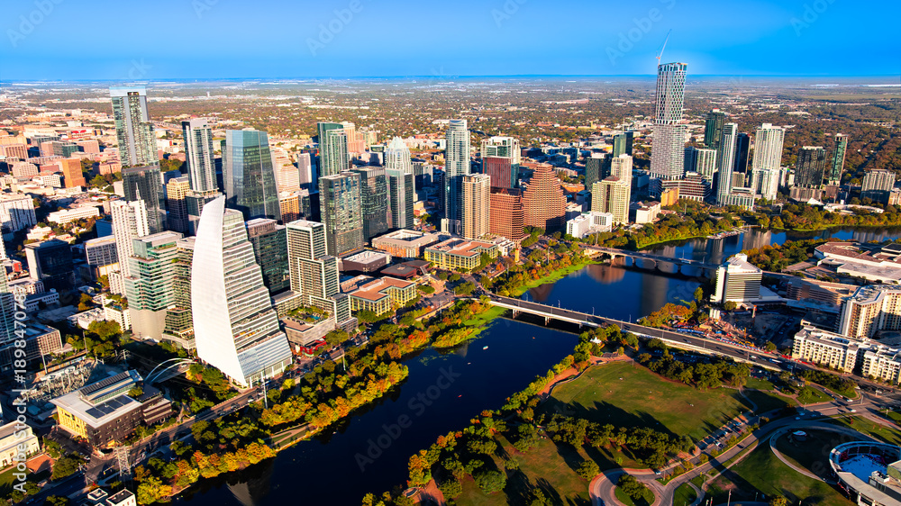 Naklejka premium Austin skyline panorama. Wide aerial panorama of downtown Austin skyline and river.