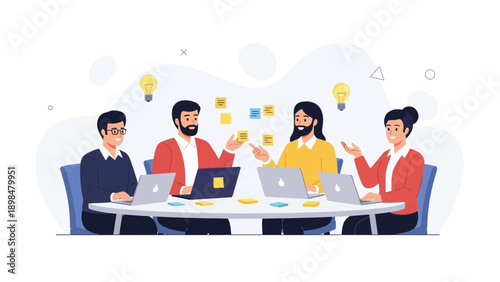 Diverse team brainstorming ideas around a table with laptops and sticky notes