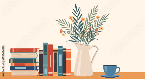 Cozy still life scene with a stack of colorful books, a white pitcher of flowers, and a blue cup of tea on a table.
